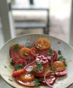 Heirloom Tomatoes with white balsamic and pomegranate dressing